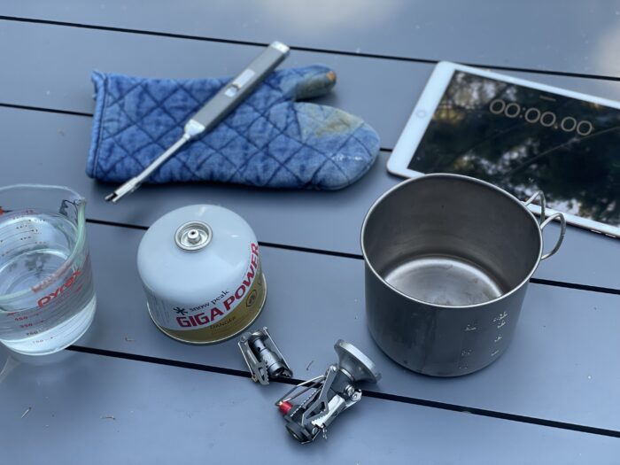 Grayl x Pathfinder Camp Stove next to its well-known competition, the MSR PocketRocket