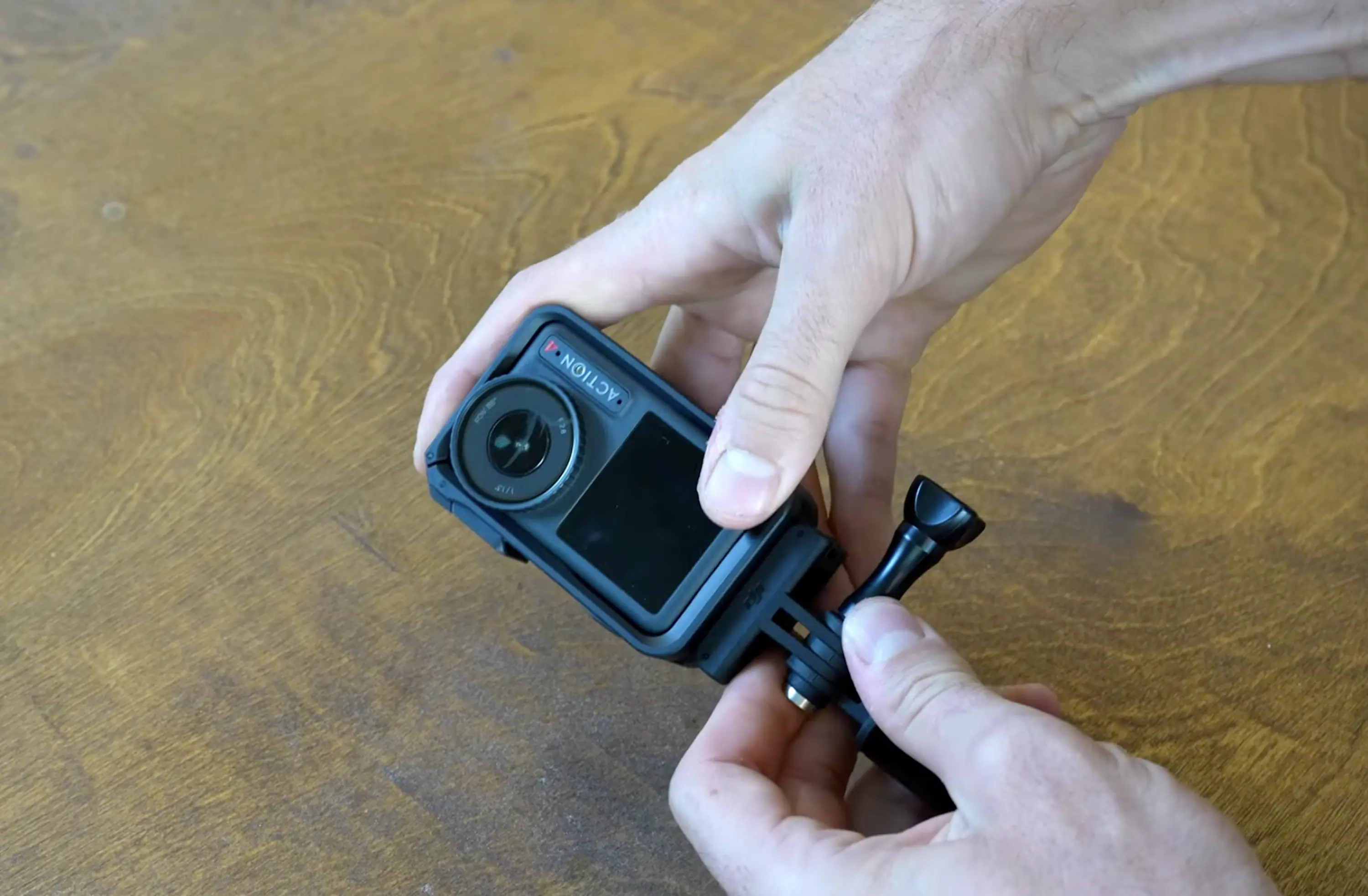 the DJI osmo camera switches from horizontal to vertical in about a second thanks to magnets on both sides.