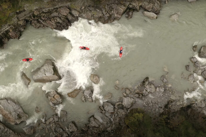 three kayaks paddle in an above shot