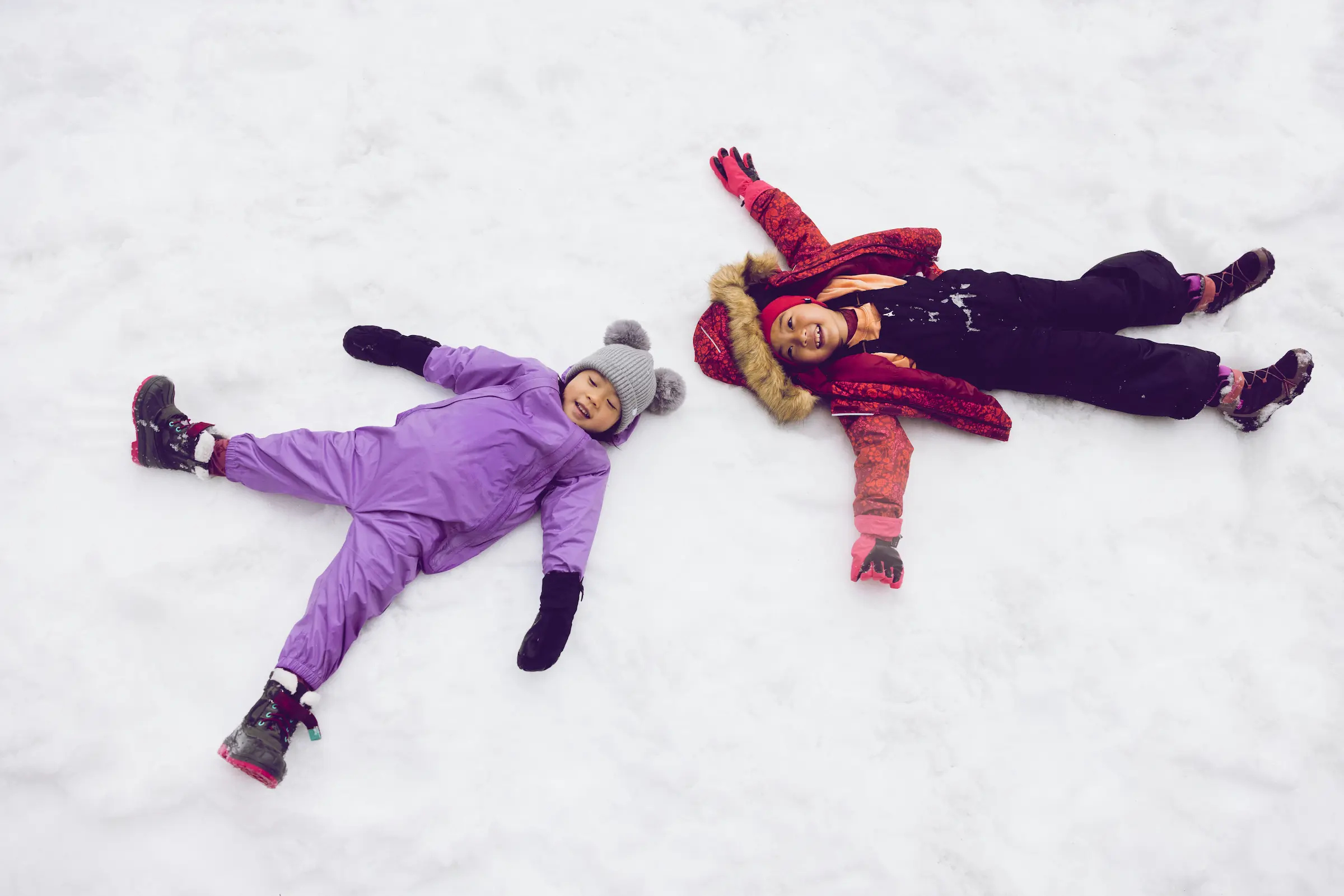 Kids play in the snow. 