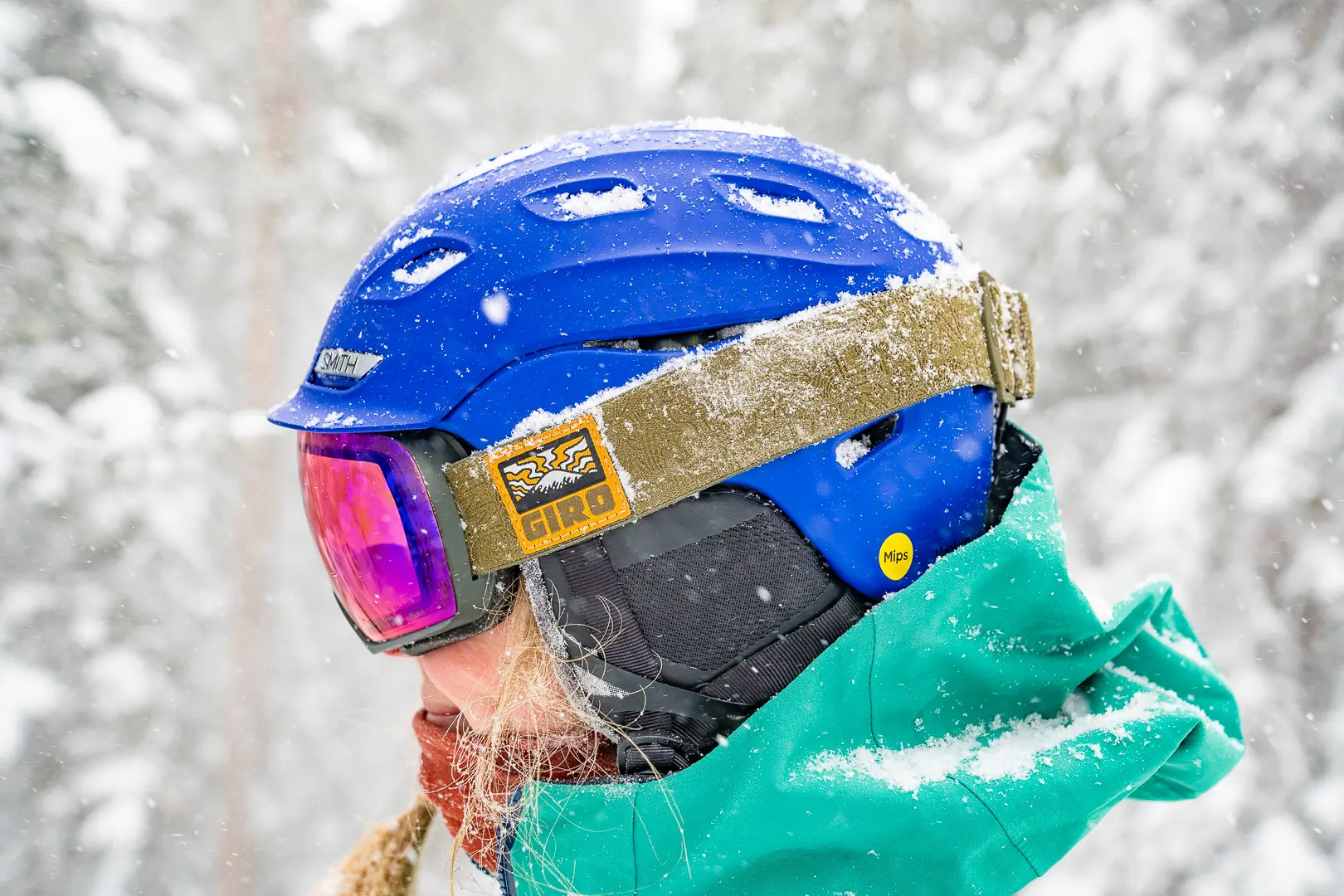 side profile of female skier with helmet and goggles 