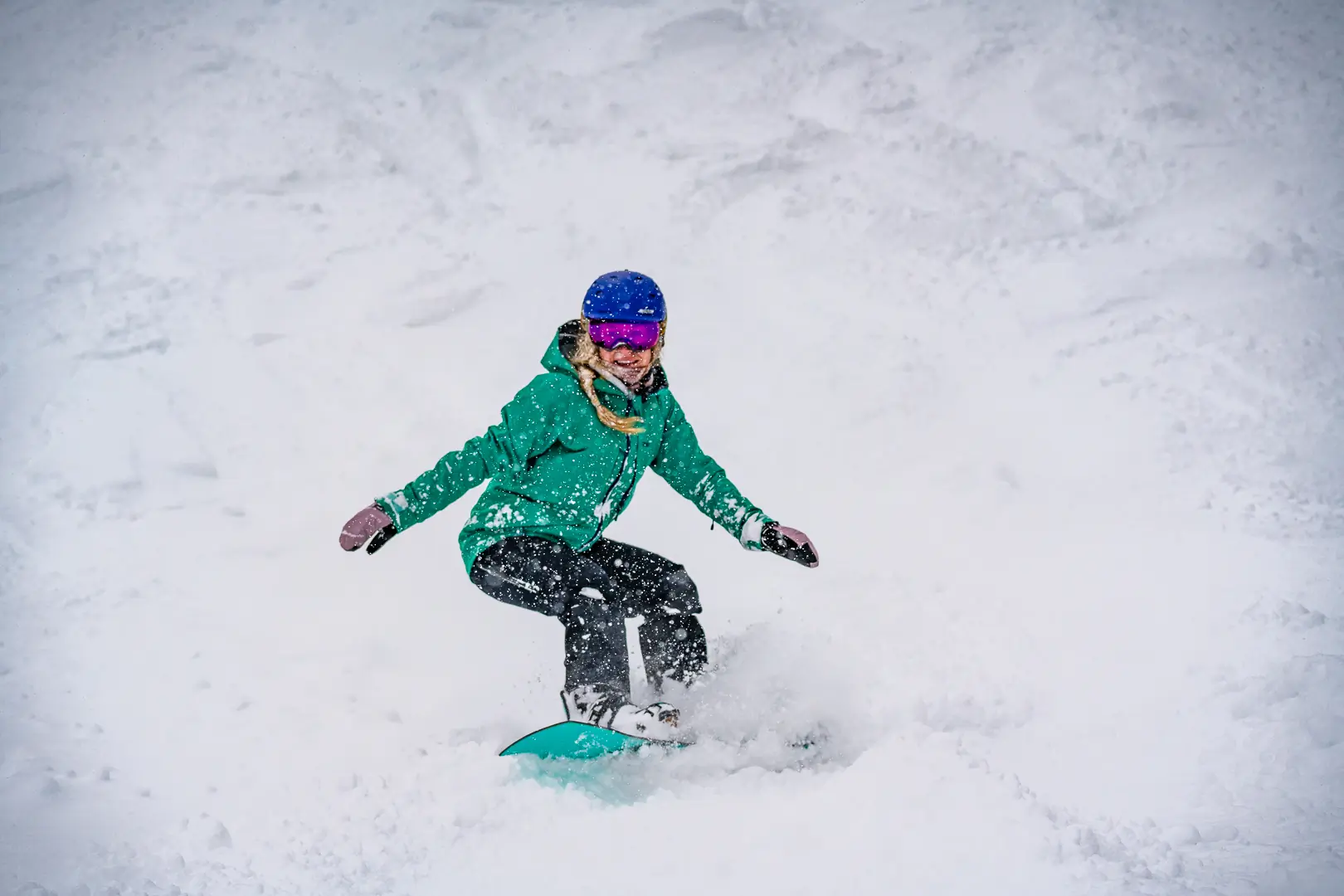 snowboarder wearing winter mittens 