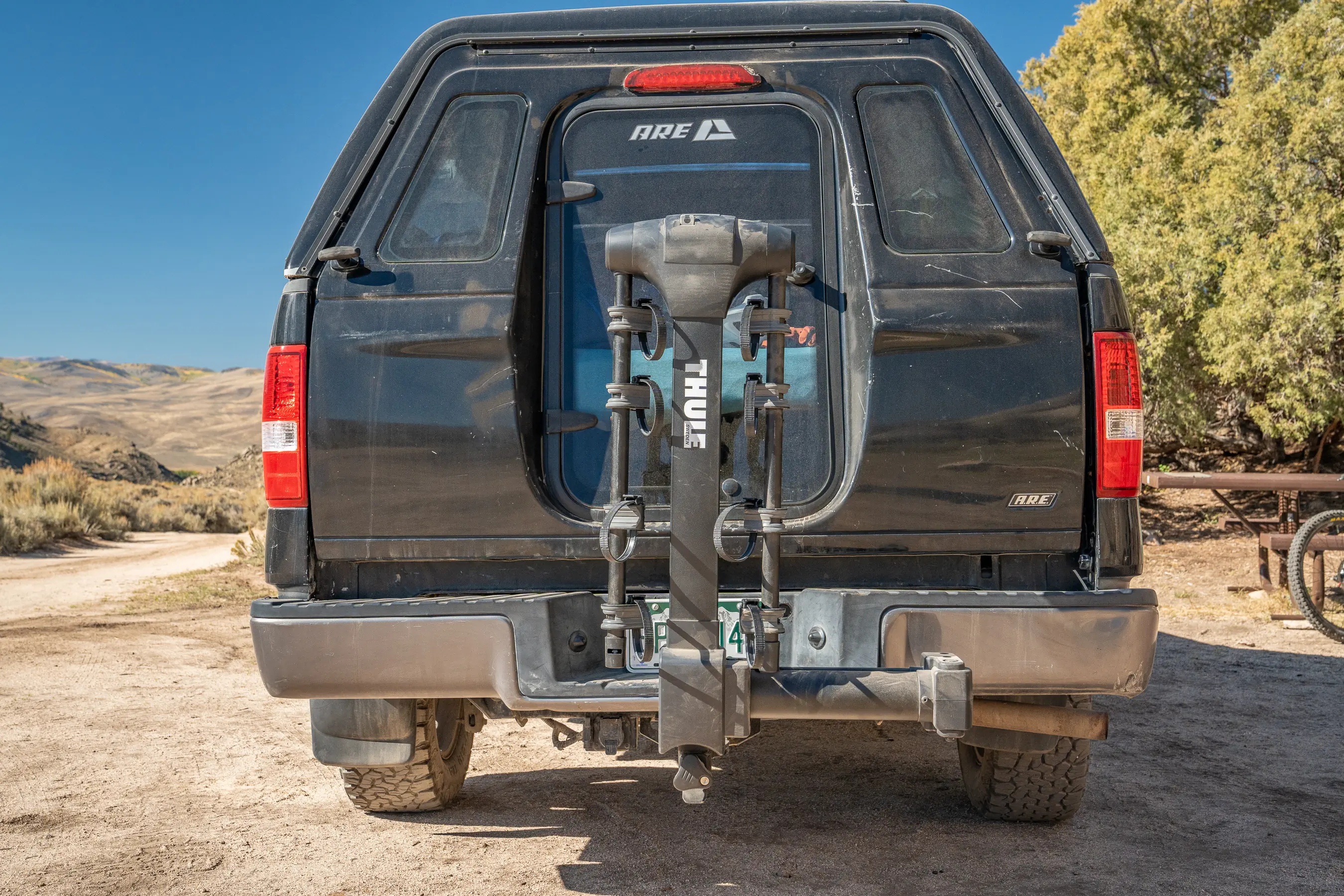 A look at a bike rack when its folded down and not loaded with bikes