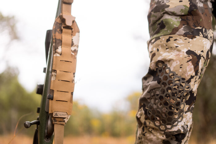 Hunter standing next to his rifle with FHF sling