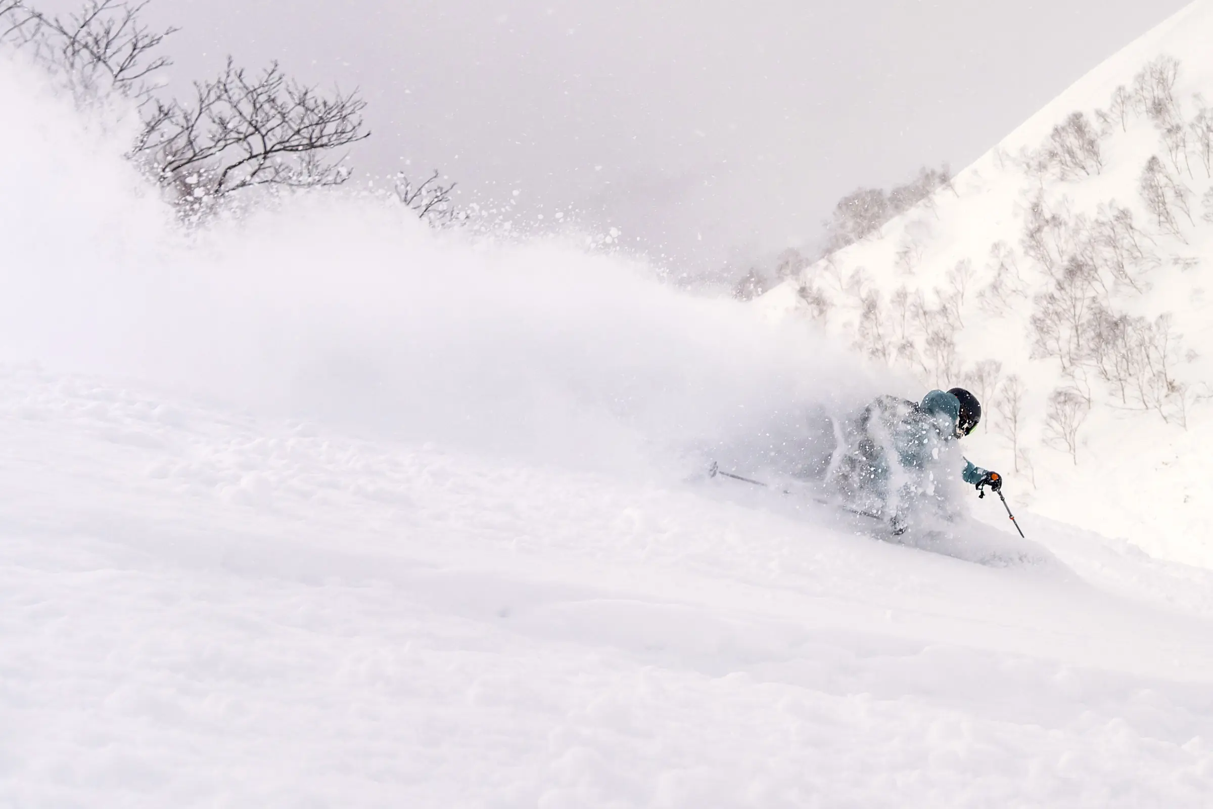 Skiing guide enjoying the perks of setting the skintrack