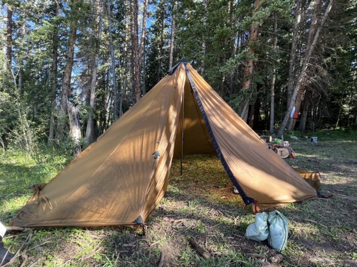 Seek Outside Redcliff tent open near forest