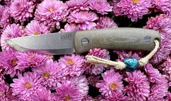 knife lulu knife displayed above flowers