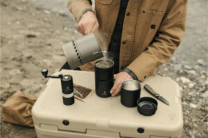 a man makes coffee with the Nest pourover kit