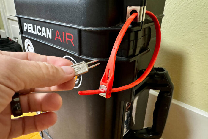 Heat Hog a hand unlocks a hiplok z lok security tie