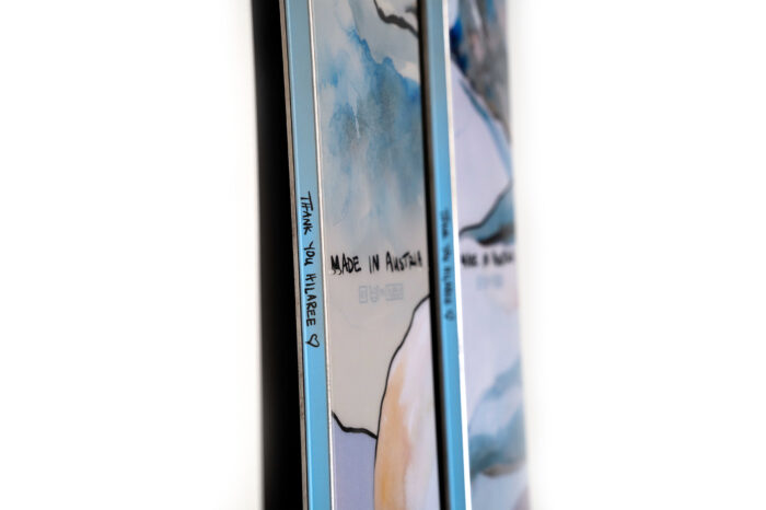limited edition blizzard skis with wolf and mountain artwork. Text reads "Thank you Hilaree. Made in Austria"