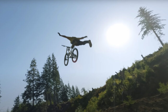 a man gets major air on a bicycle