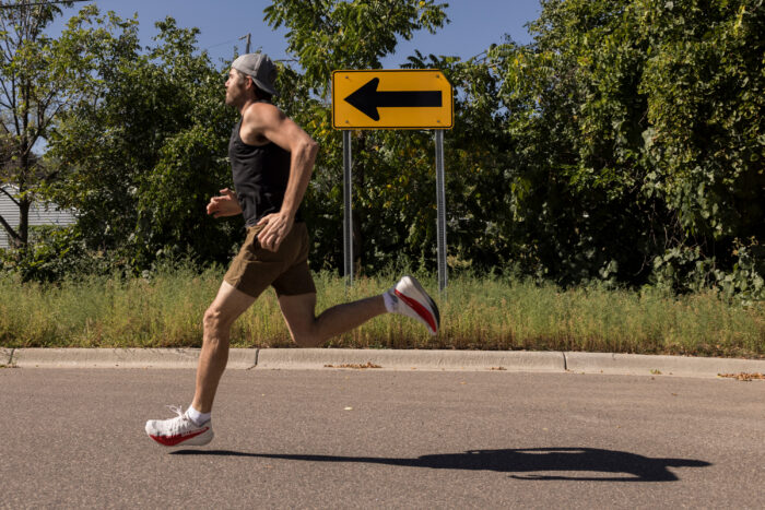 man running on road