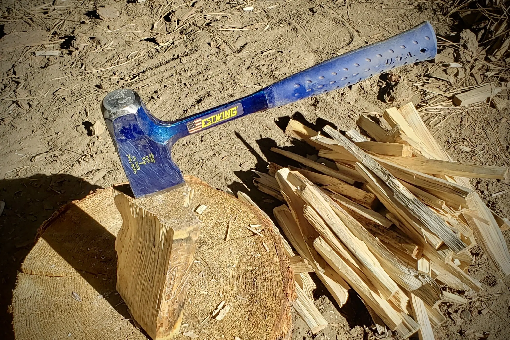 a closeup view of the estwing fireside friend splitting tool