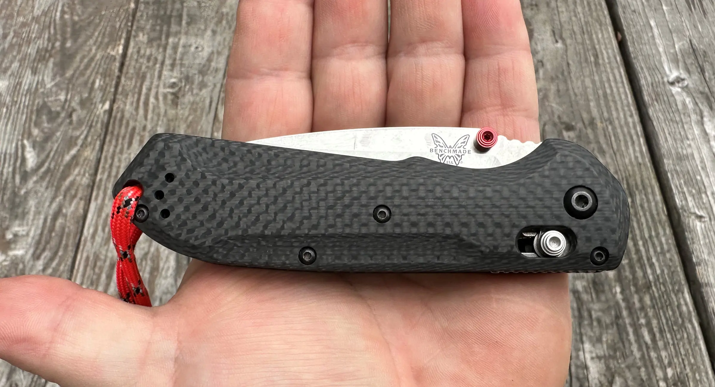Benchmade’s Freek 560-03 knife folded on author's hand