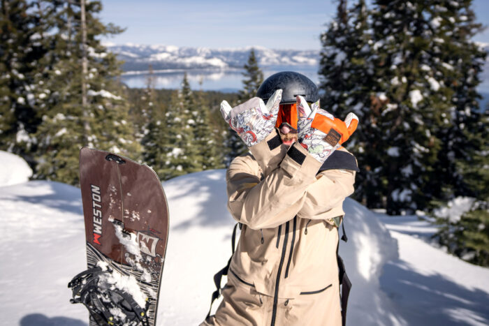 snowboarder wearing Oyuki x Smith collab gear