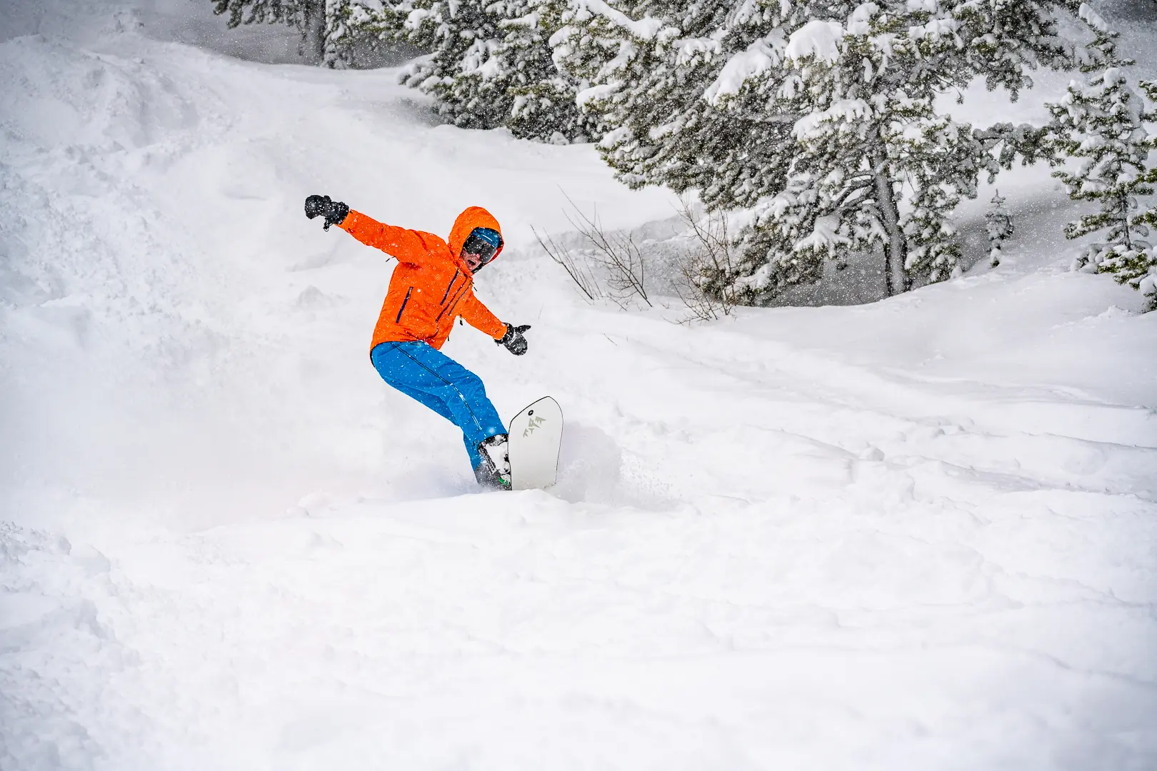snowboarder floating in the powder