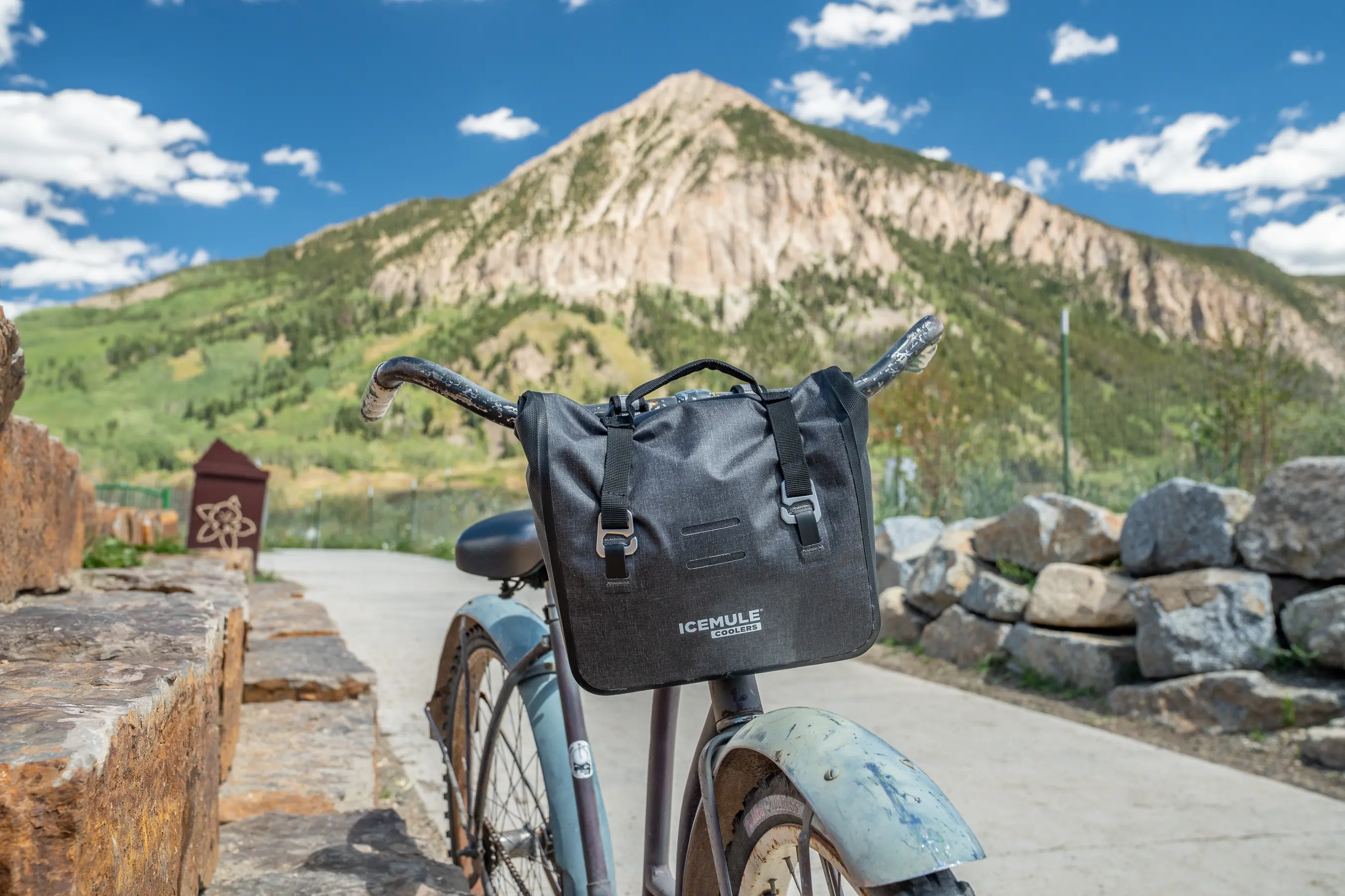 soft cooler on bike with mountain backdrop 