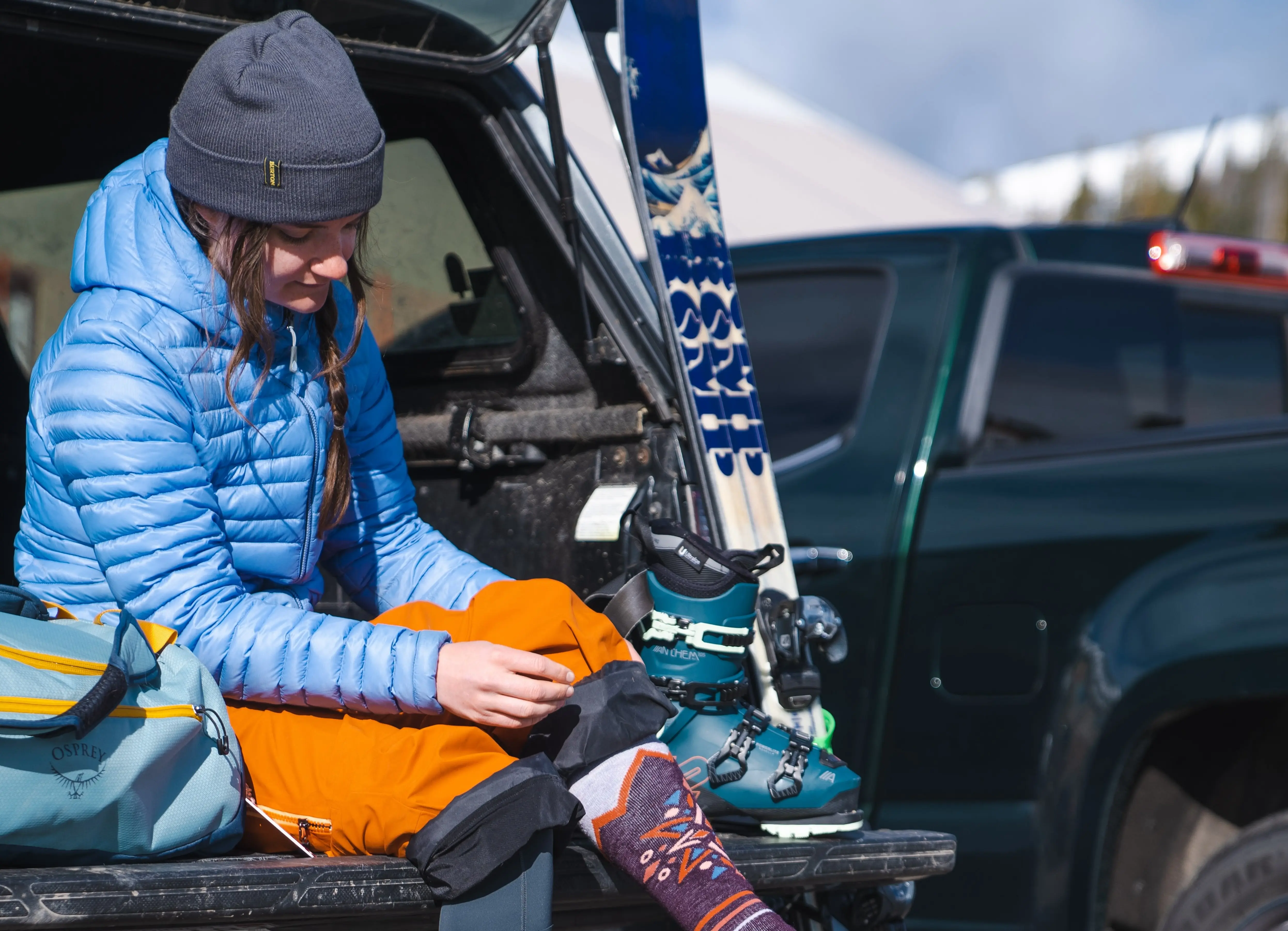 Women's down jackets are a great layer to have at the trailhead or while booting up in the morning at the ski area; (photo/Eligh Purvis)