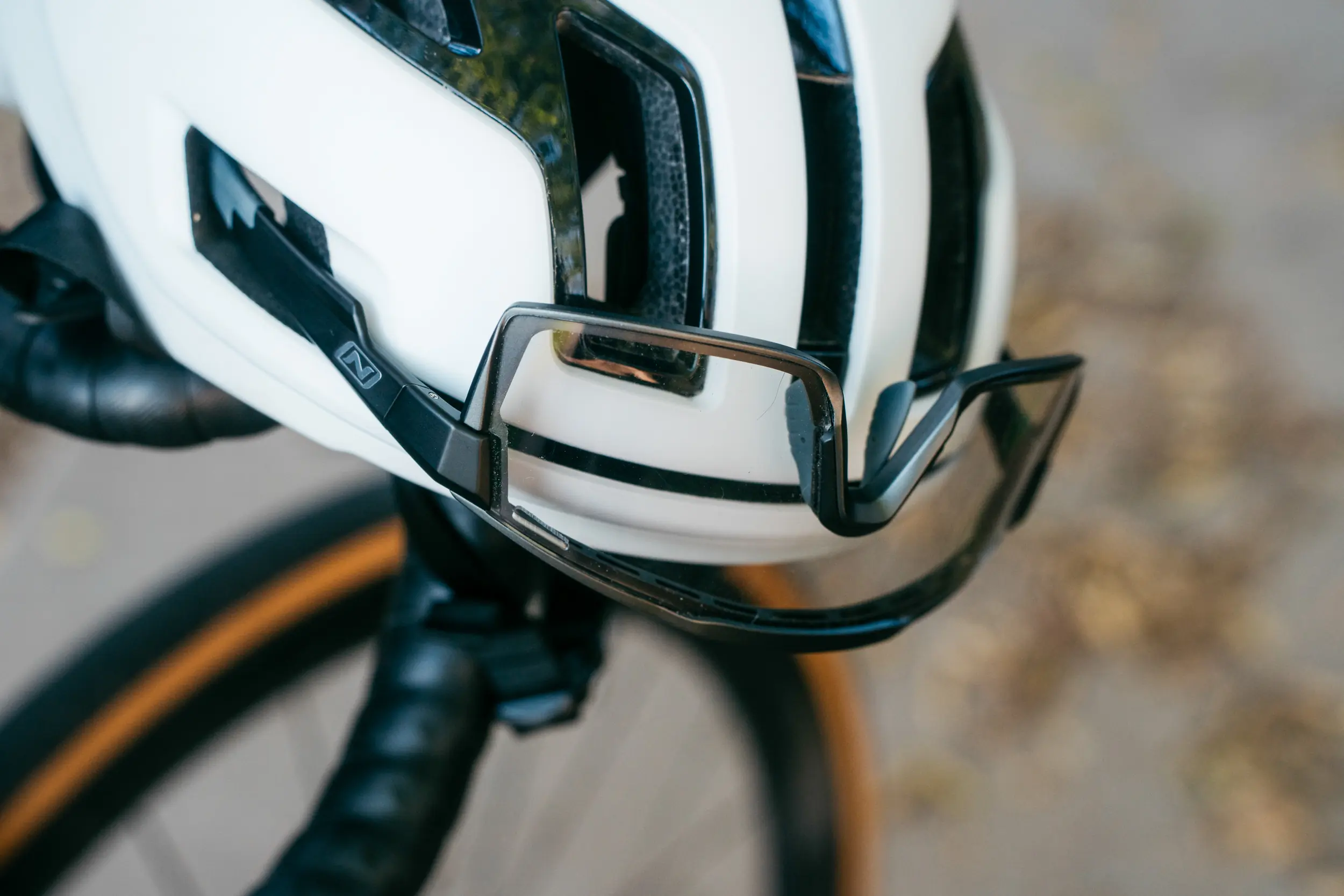 Optic Nerve FixieMAX Photochromic cycling sunglasses on a road helmet