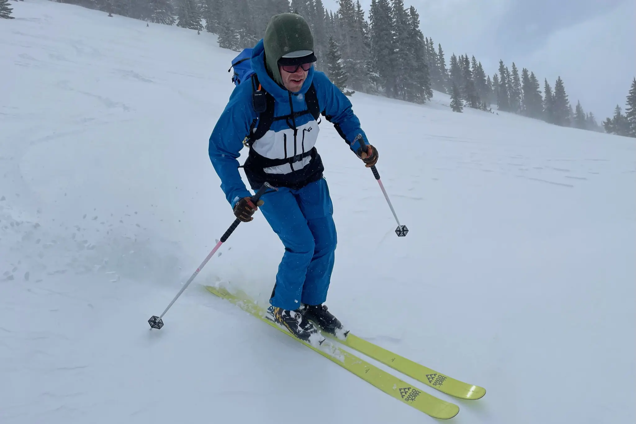skier going down a snowy mountain