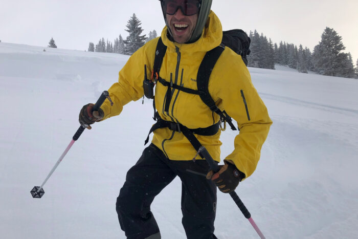 skier wearing full ski gear to go downhill