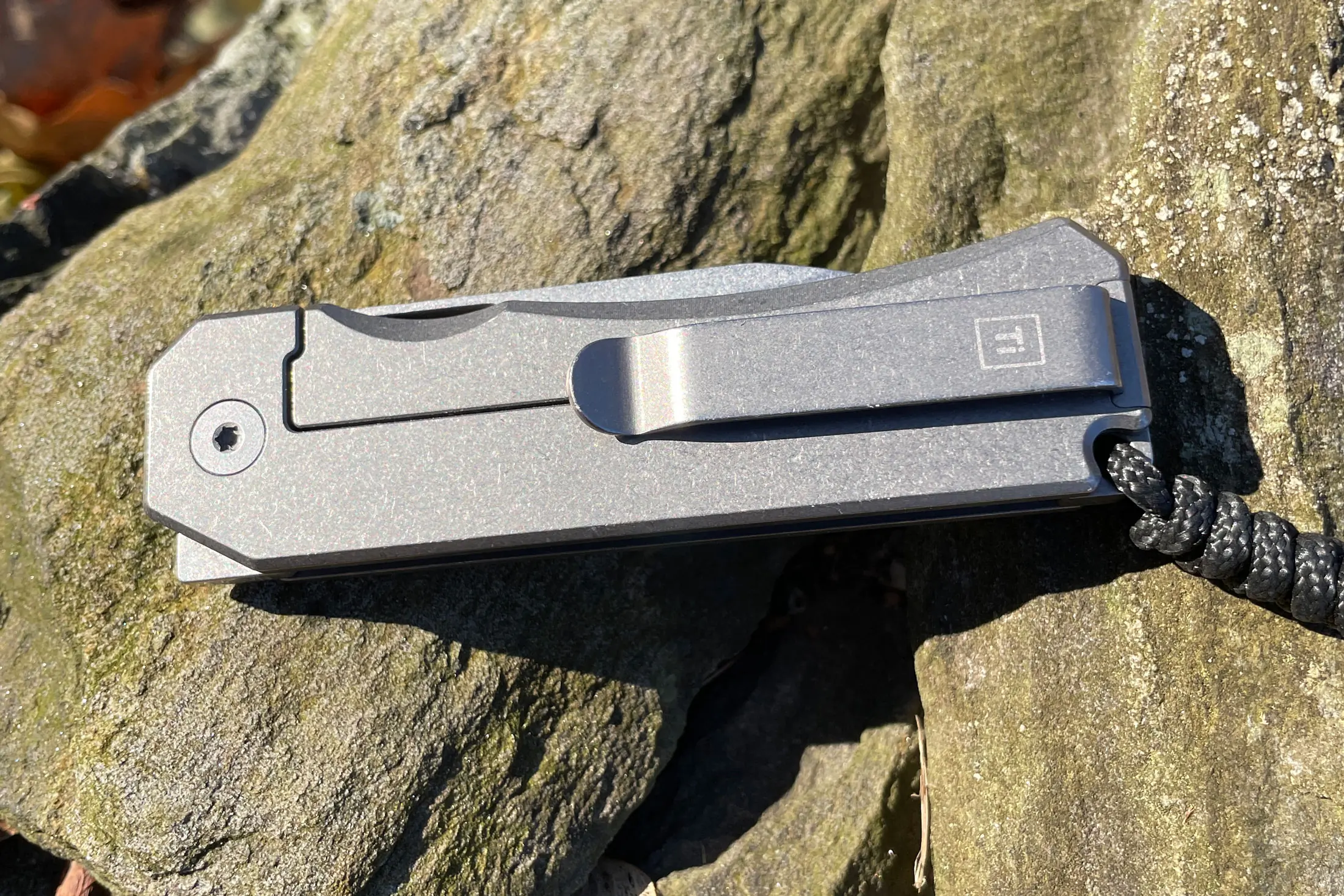 Big Idea Designs Ti Knife closed on a rock