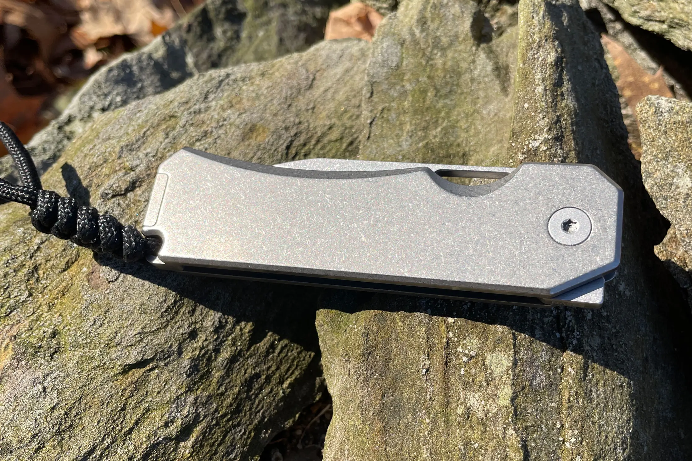 Big Idea Designs Ti Knife closed on a rock