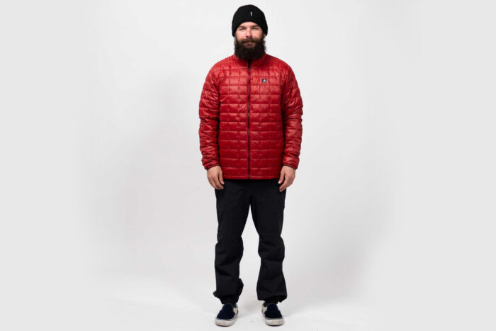 a man wearing a Jones Ultra Re-Up Recycled jacket