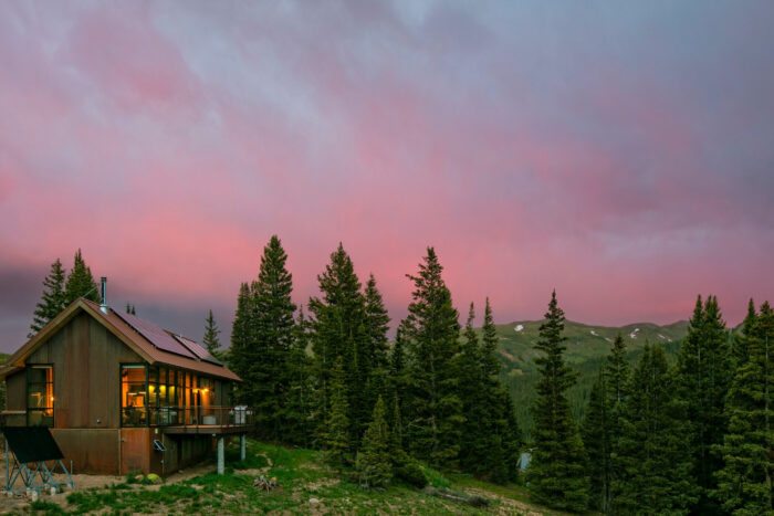 a lodge in the San Juan mountains at sunset