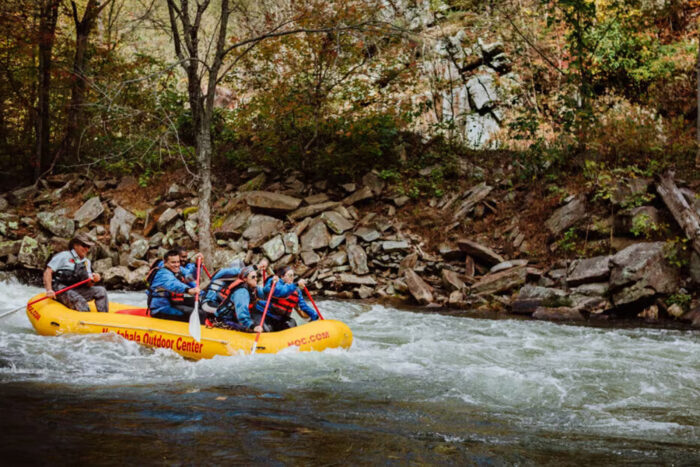 a group of people raft 