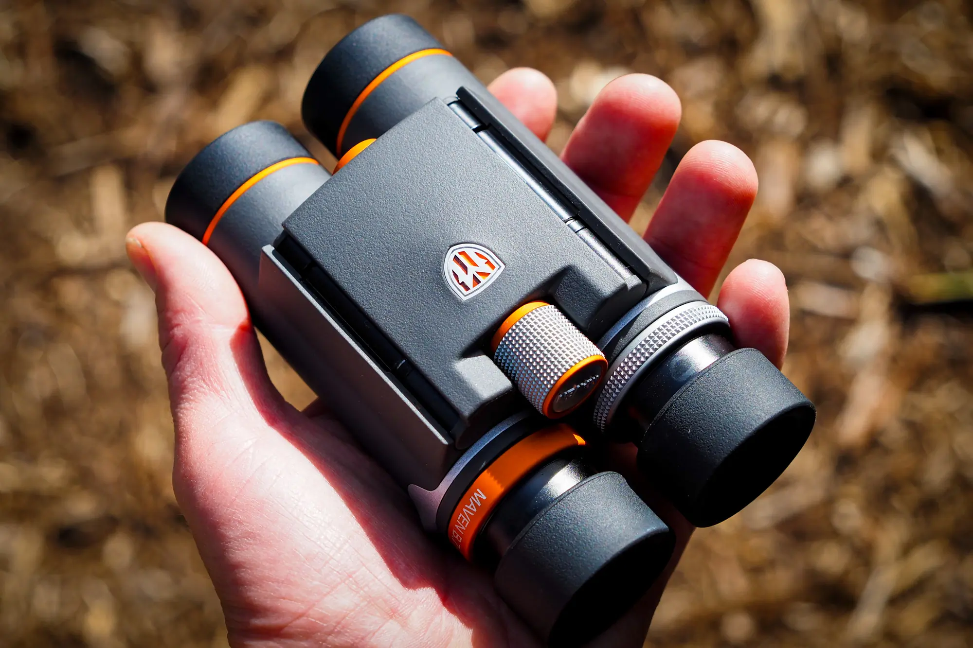Maven B.7 binoculars in a hand