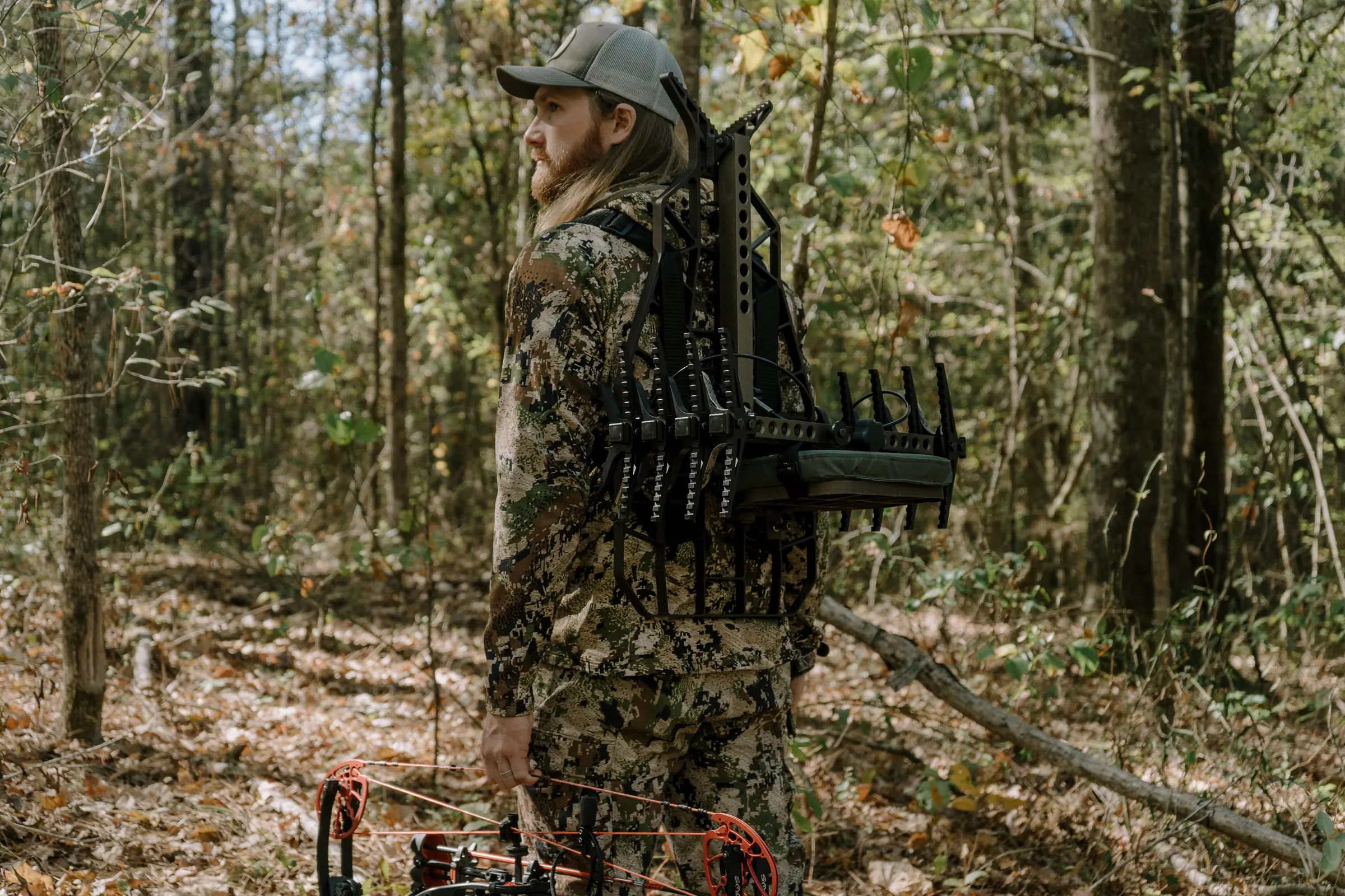 hunter carrying the Beast Gear Treestand & Climbing Sticks