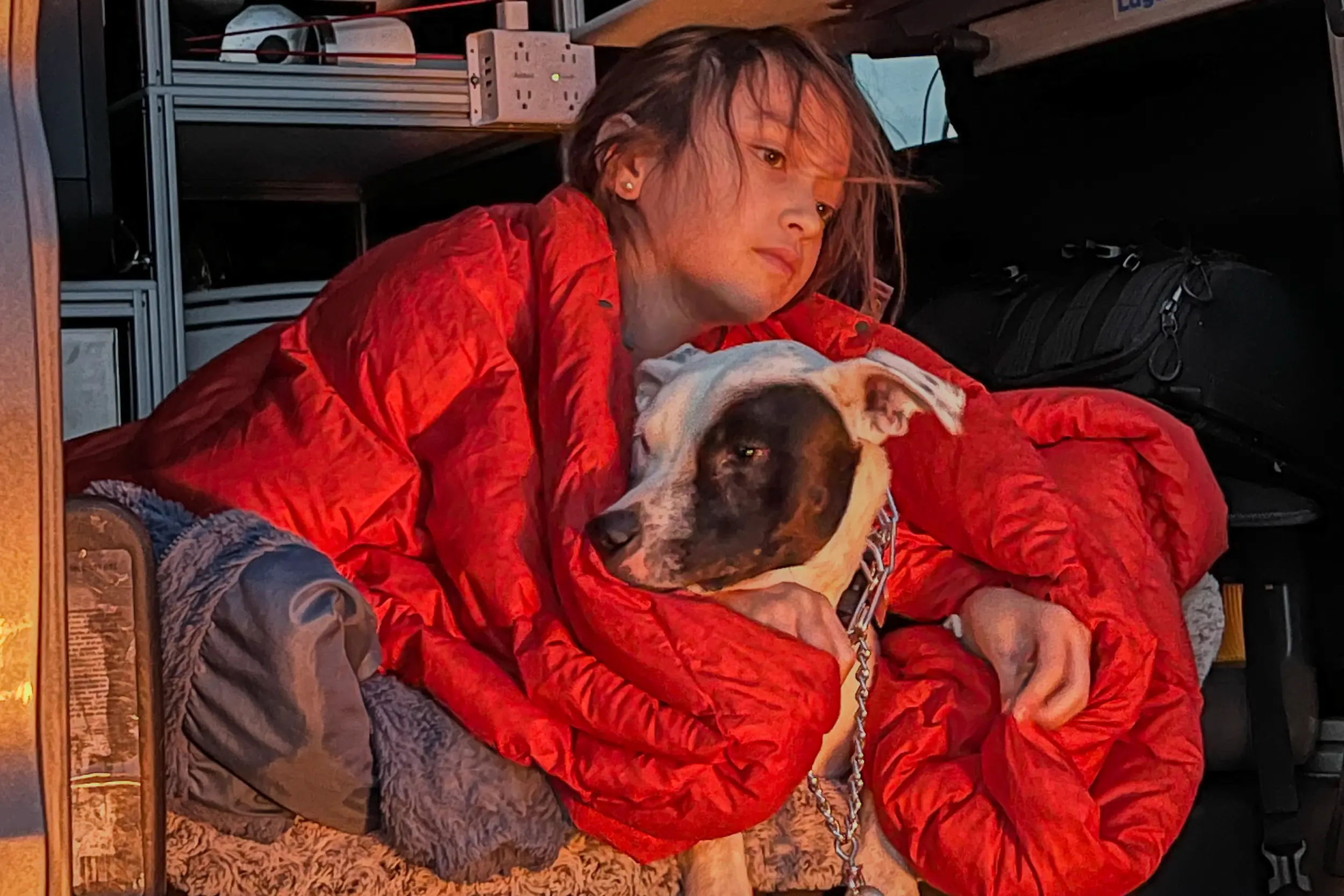 Child and dog in the glow of the Howl Campfires Howl R4