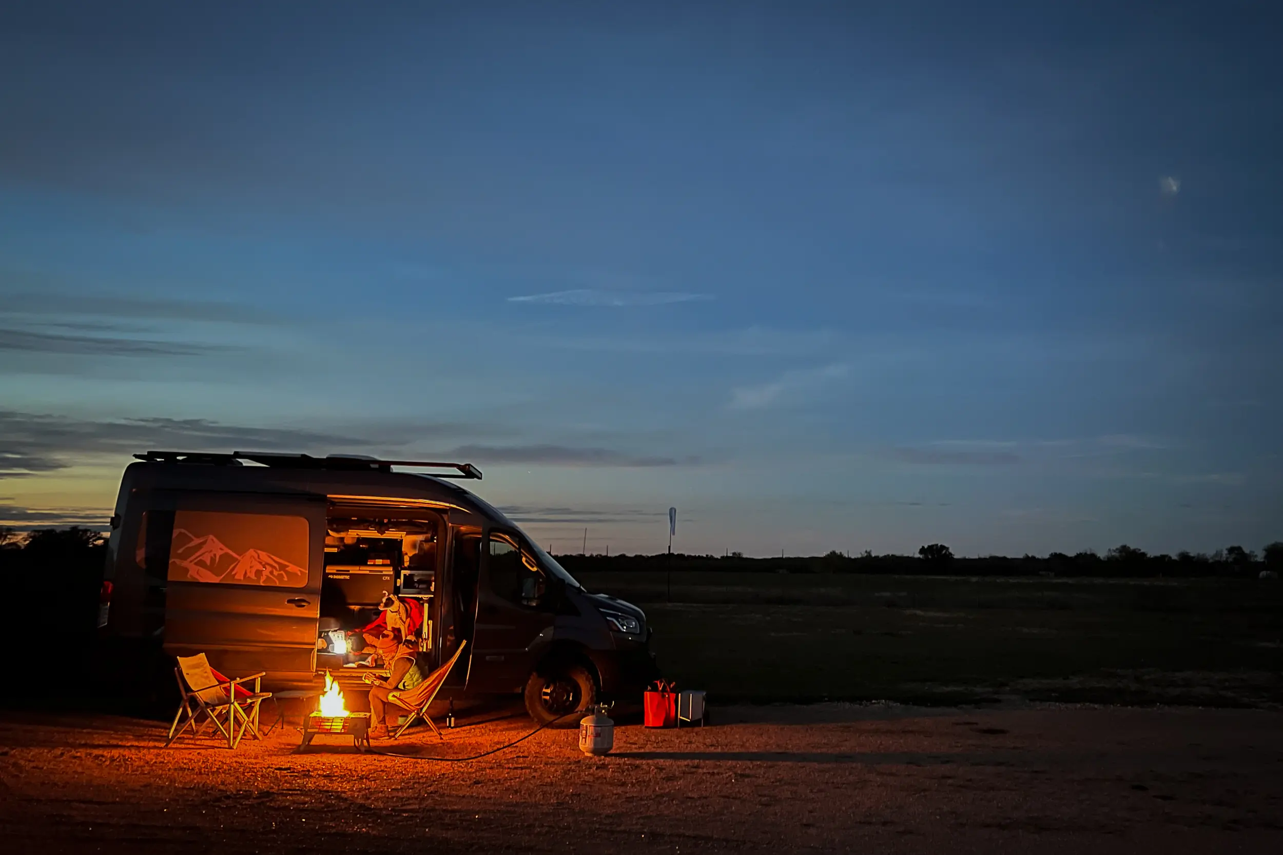 Howl Campfires Howl R4 campfire at night while van camping