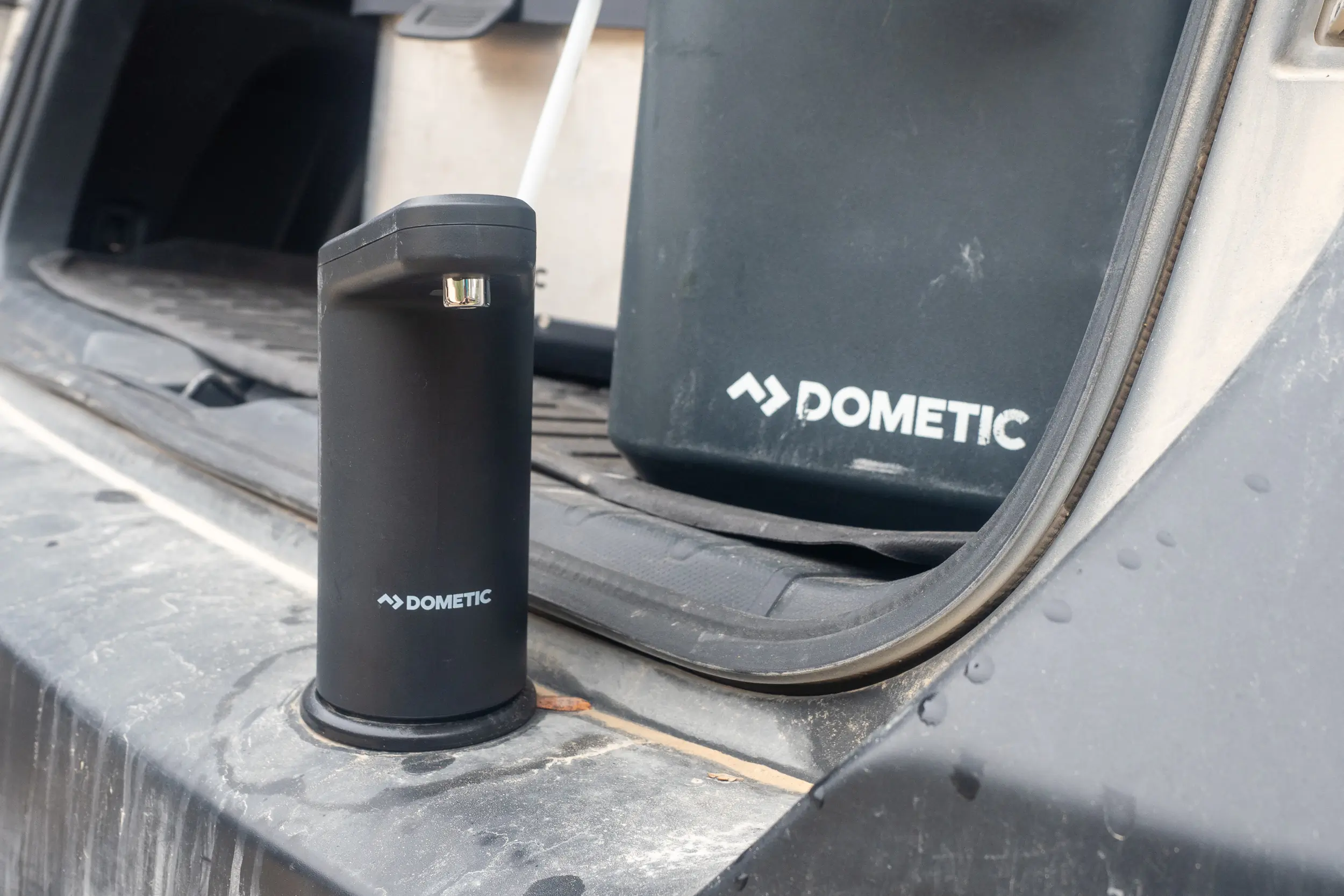 Dometic GO Hydration Water Faucet on rear bumper of car
