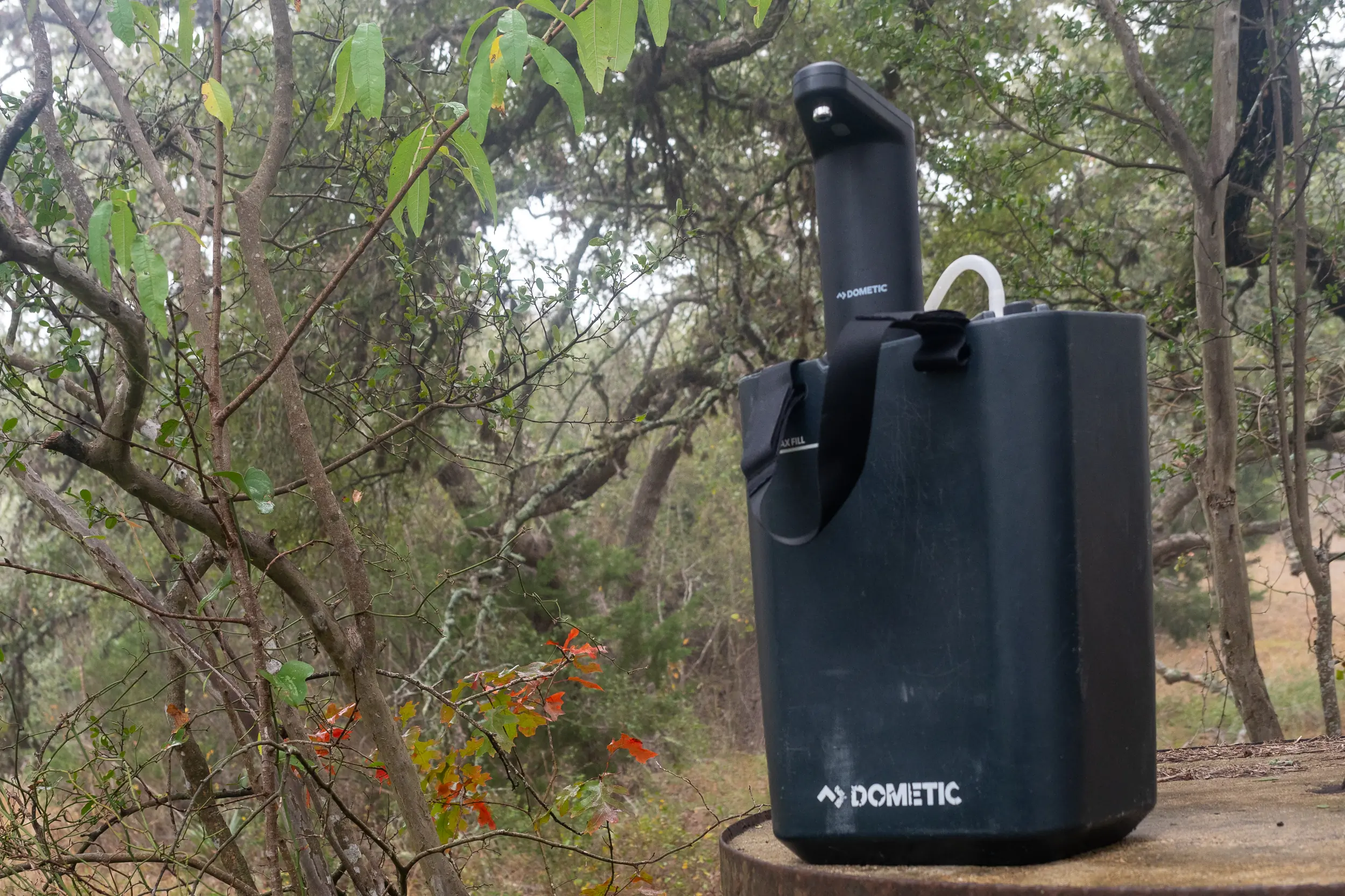 Dometic GO Hydration Water Faucet and GO Water Jug in car camping setup