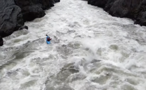 emile lalonde kayaker on the frothy Stikine River in Canada