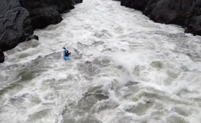 emile lalonde kayaker on the frothy Stikine River in Canada