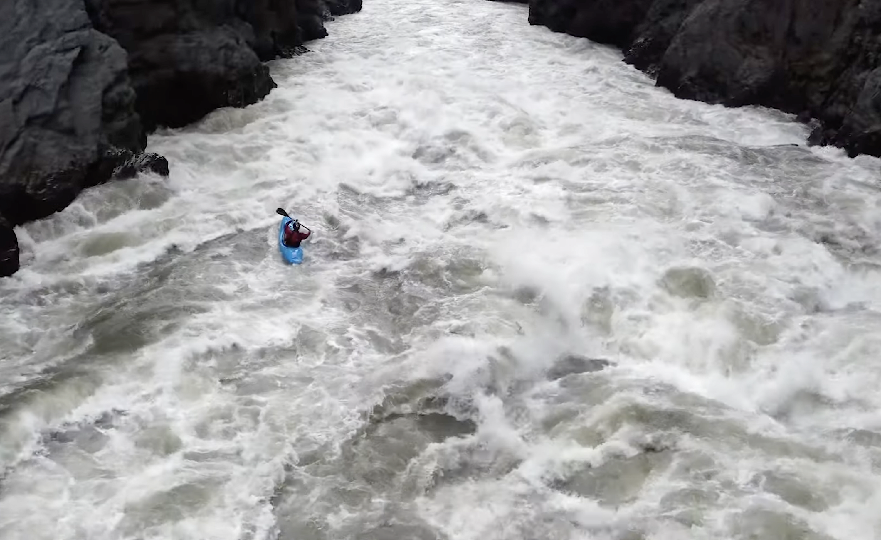 emile lalonde kayaker on the frothy Stikine River in Canada