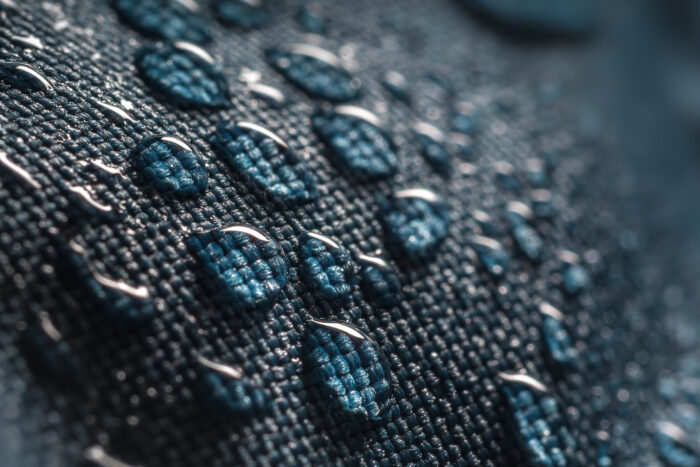 water beads on a fabric