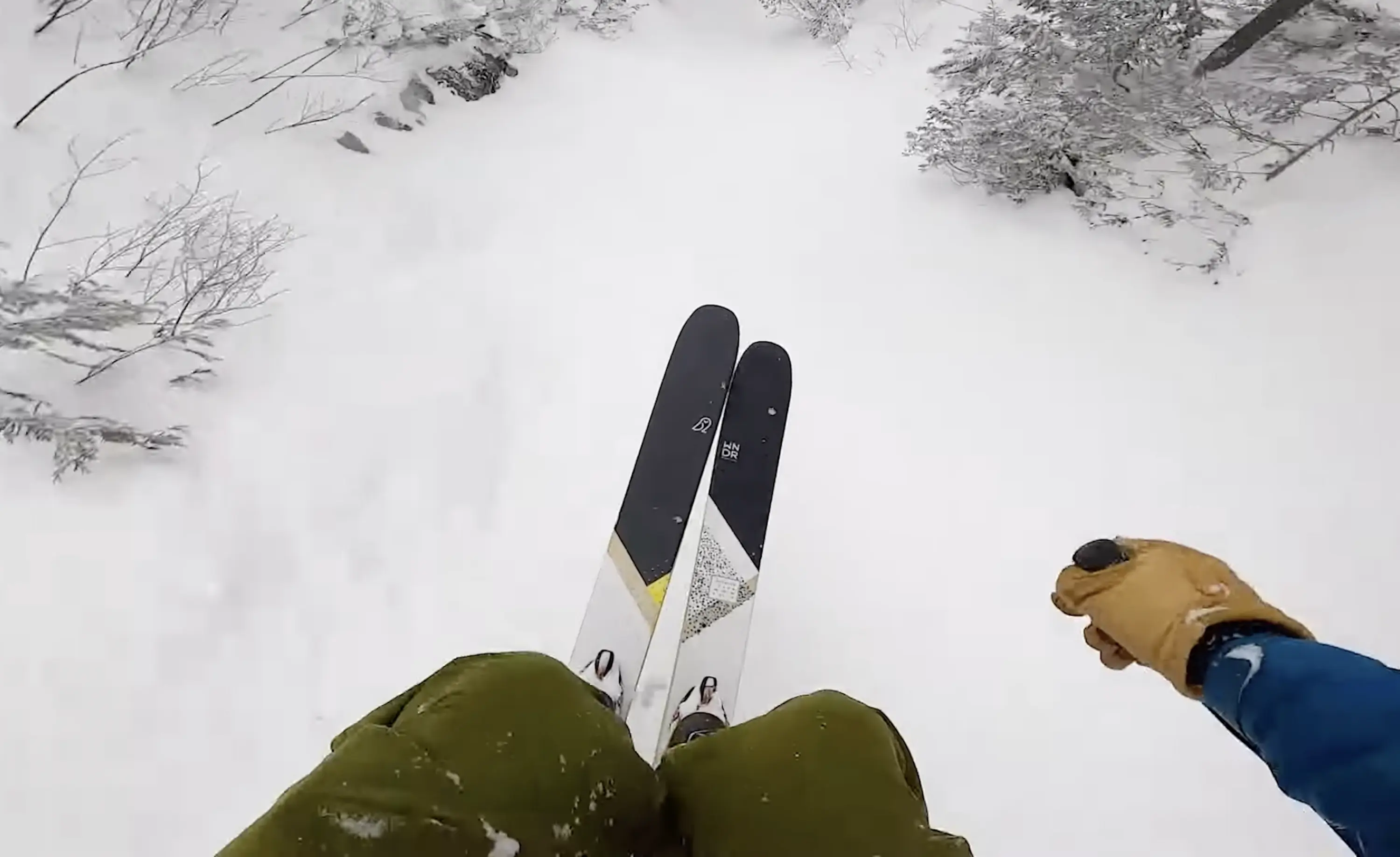 GoPro POV of Nate Trachte skiing on a pair of WNDR Alpine skis in backcountry mountains