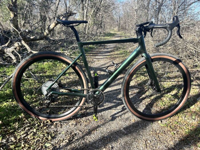 Desiknio X2 Gravel e-bike on a single track trail.