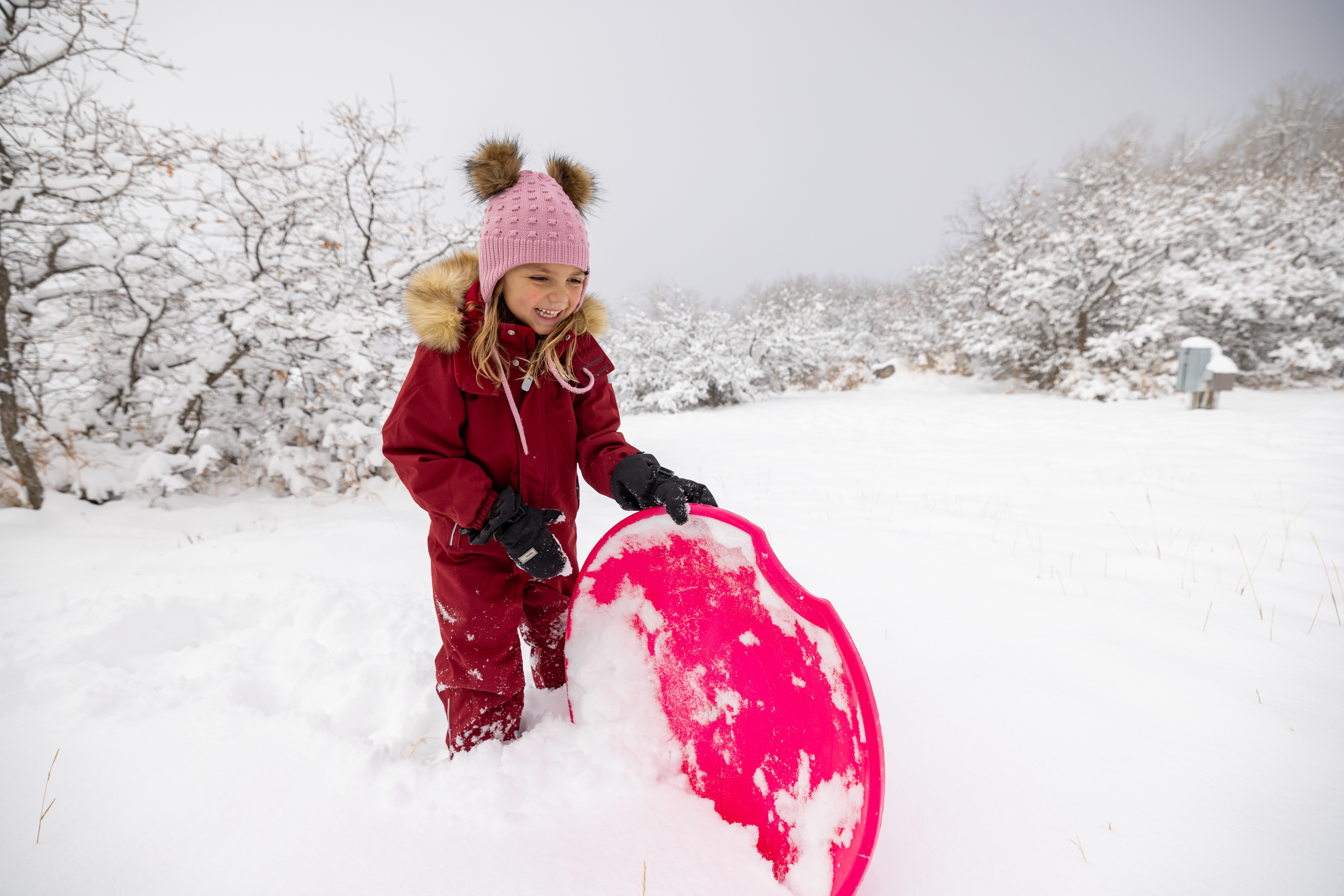 One GearJunkie tester plays in deep snow on a sled day; (photo/Will Rochfort)