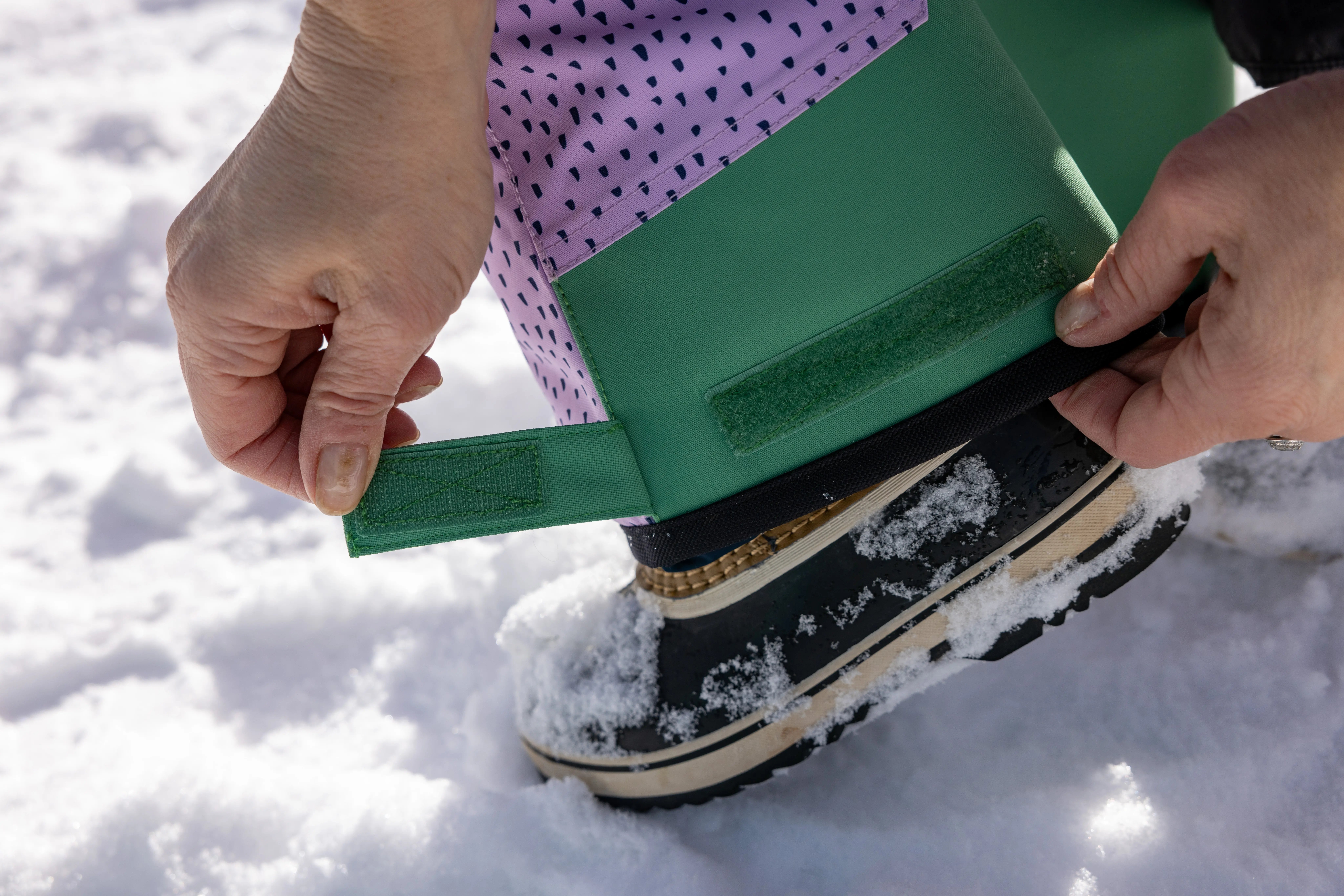 velcro adjustment on hem of winter snow pants for kids