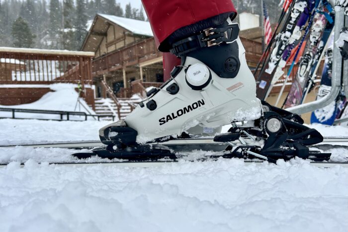 A salomon s/pro supra BOA boot clicks into a ski