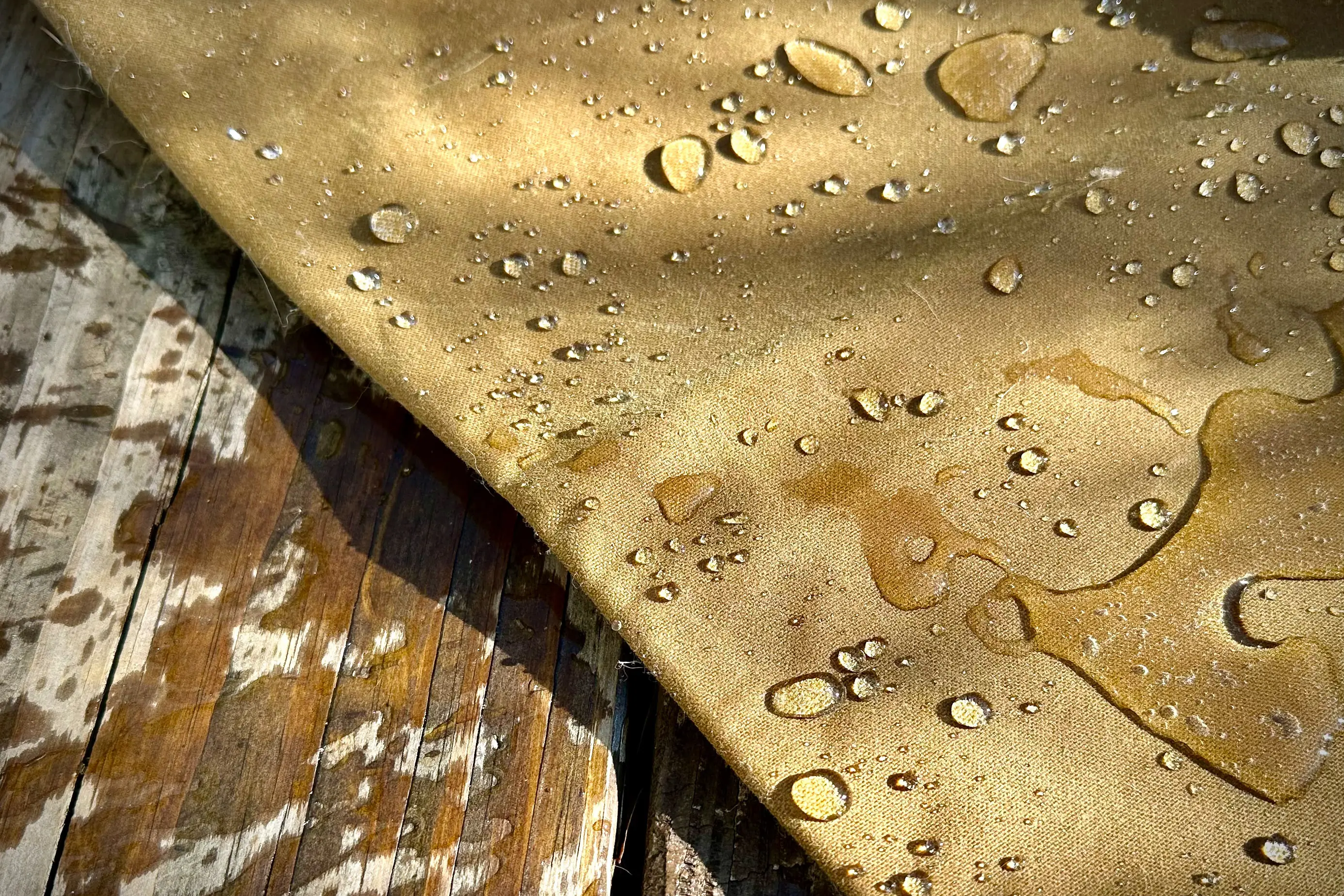 Water beading on waxed canvas work pants