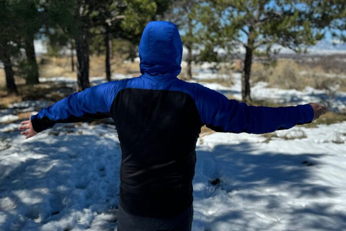 Deviator Jacket has windbreaker shell fabric on front and over shoulders but exposed insulation in the back