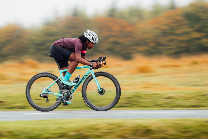 Woman riding a high-end road bike