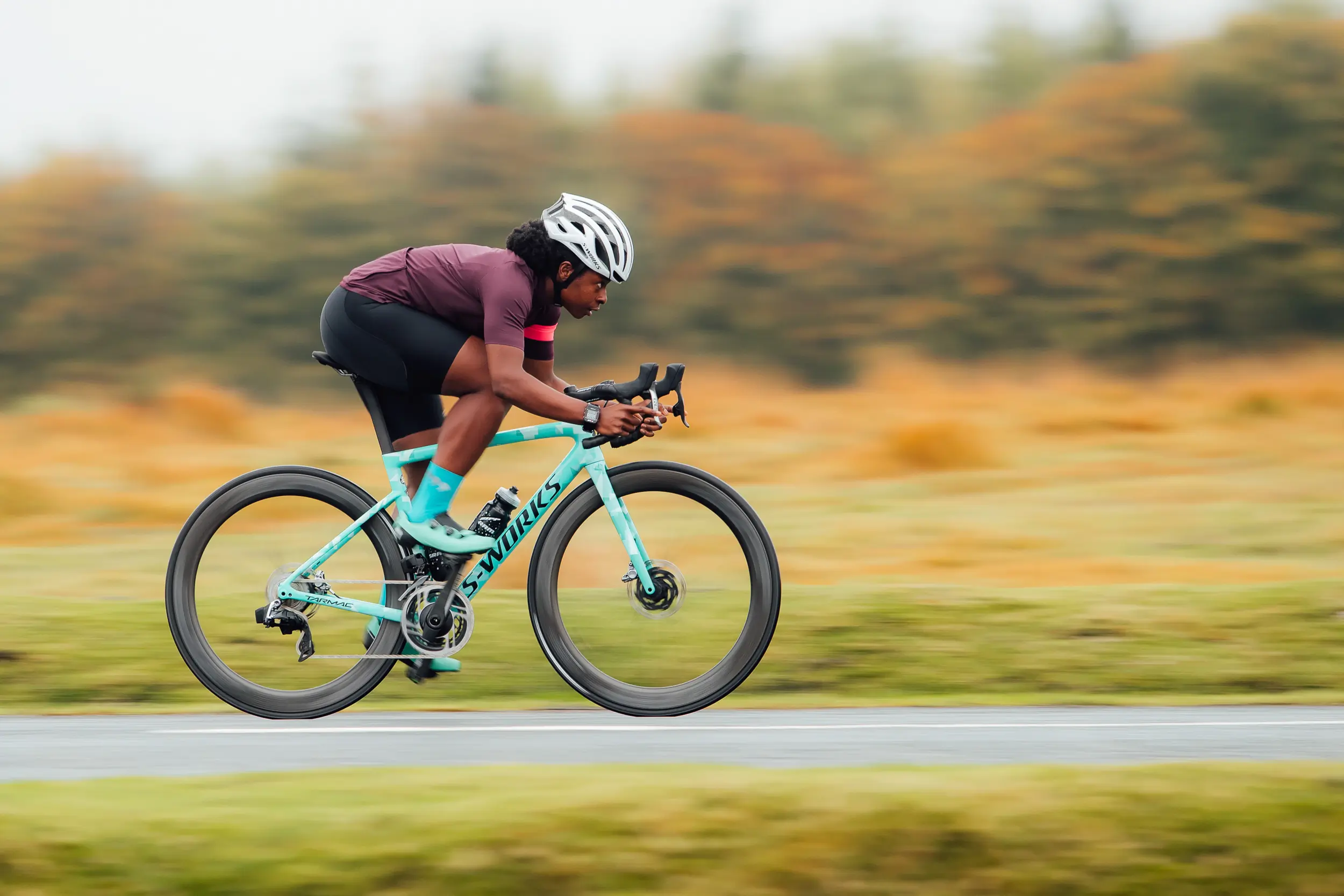 Woman riding a high-end road bike