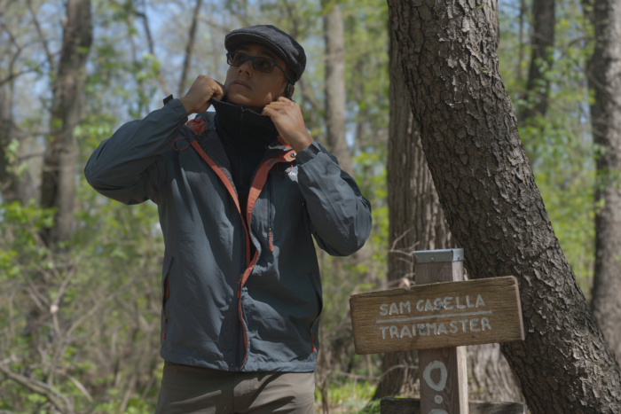 Author wearing brynje thermo base layer under the rain coat on the trail